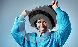 Happy, black woman and healthy natural hair with afro against blue studio mockup background. Young beautiful female
