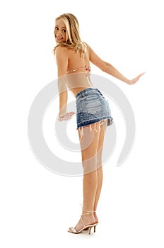 Happy blond in denim skirt