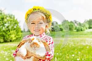 Happy blond girl with yellow flowers circlet