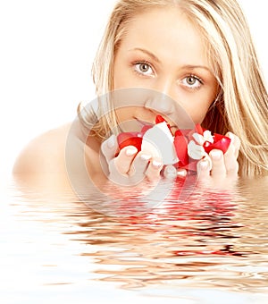 Happy blond in water with red