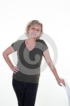 Happy blonde caucasian senior woman smiling beautiful on white background with hands on rear chair casual smile