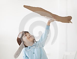 Happy boy with airplane