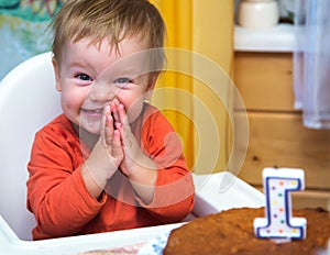 Happy boy celebrates his first birthday