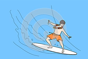 Happy boy child surfing on summer holidays