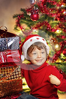 Happy boy with christmas gift