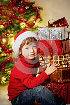 Happy boy with christmas gift