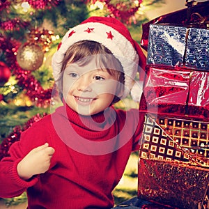 Happy boy with christmas gift