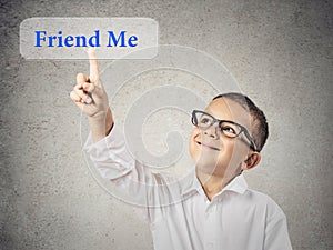 Happy boy clicks on friend me button