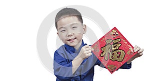 Happy boy holding blessing paper for new year means get luck