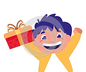 Happy boy holding christmas gift