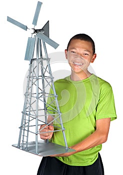 Happy boy holds windmill model