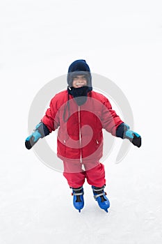 Happy boy ice skating