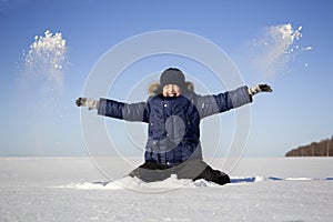 Happy boy jump outdoors