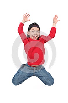 Happy boy jumping midair photo