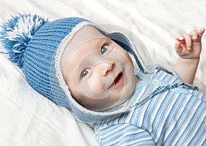 Happy boy in knitted cap