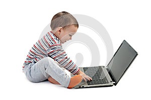 Happy boy with laptop isolated