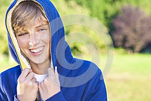 Happy Boy Male Child Teenager Laughing Wearing Hoody photo
