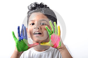 Happy boy with paint having fun