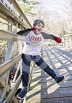 Happy boy playing outside