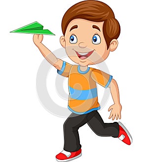 Happy boy playing paper airplane