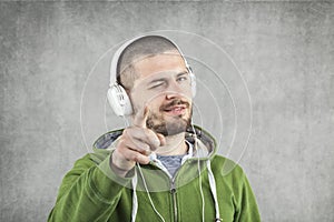 Happy boy pointing at you