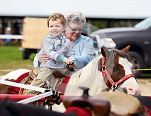 Happy Boy on a Pony Ride