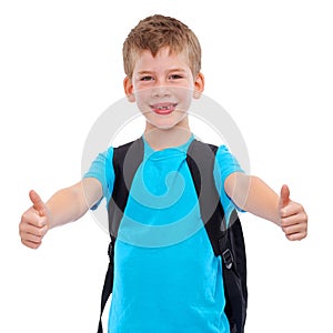 Happy boy, portrait and thumbs up for winning in education, learning or success with backpack. Child showing thumb emoji