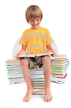 Happy boy reading books