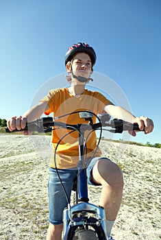 Happy boy ride bikes outdoors