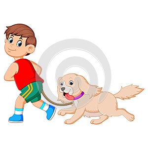 A happy boy is running and pulling his cute brown dog
