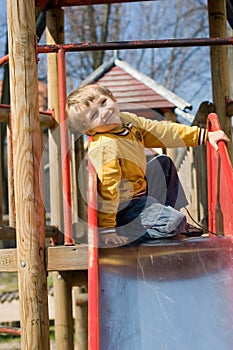 Happy Boy on Slide