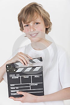 Happy Boy Smiling With Clapperboard