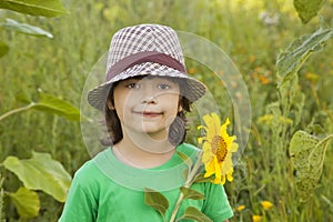 Happy boy with sunflower