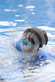 Happy Boy in the Swimming Pool