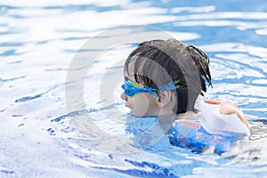 Happy Boy in the Swimming Pool