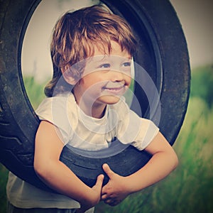 Happy boy on swing