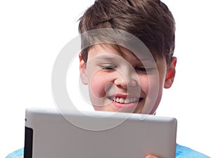 Happy boy with a tablet computer