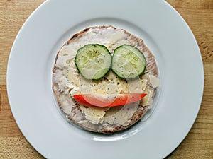 Happy breakfast.  Cheese sandwich  with cucumber and red pepper