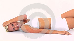 Happy breathless blonde lying on back