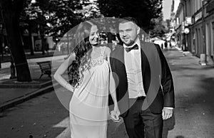 Happy bride and groom. Cheerful married couple. Just married couple embraced. Wedding couple
