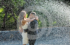 Happy bride and groom. Cheerful married couple. Just married couple embraced. Wedding couple