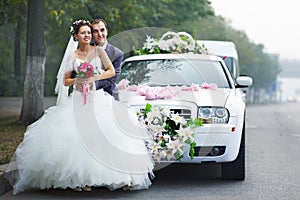 Happy bride and groom with lmo