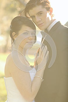 Happy Bride and Groom Married Outdoors in a Forest