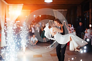 Happy bride and groom a their first dance, wedding