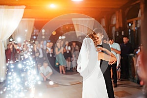 Happy bride and groom a their first dance, wedding