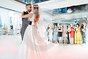 Happy bride and groom their first dance