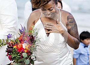 Happy bride and groom in a wedding ceremony at a tropical island