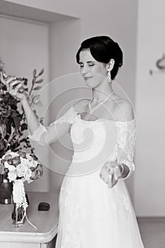 Happy Bride spraying perfume