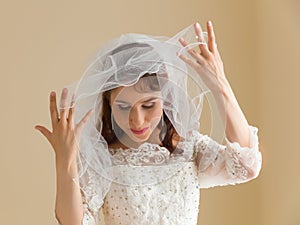 Happy bride with white veil