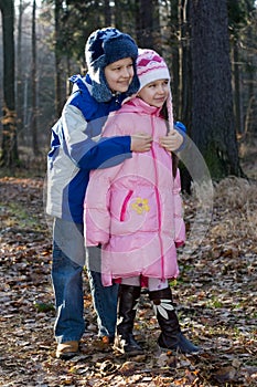 Happy Brother And Sister In Forest